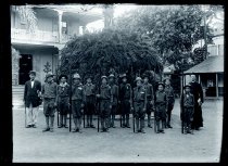 Father Reginald Yzendoorn, SS.CC., with Boy scout troop, Catholic Mission grounds, Honolulu, Hawaii.
