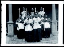 Altar boys with priest.