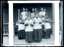 Altar boys with priest.