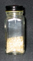 Bottle of Lexan Pellets