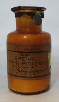 Bottle containing 3-Methyl-1-Phenylpyrazolon [3-Methyl-1-Phenylpyrazolon]