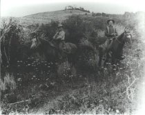 Men on horseback
