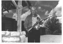 Bill Judge holding Springfield Rifle