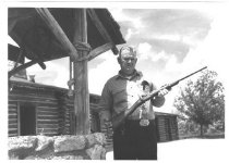 Bill Judge holding Springfield rifle