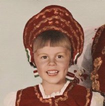 Portrait of Julie Hatch in harvest festrival costume