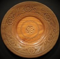 Carved wooden plate