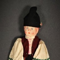 Male doll in folk costume