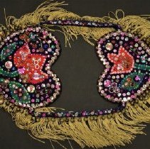 Decorative piece with jingle bells and beads