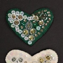 Two heart shaped decorative pieces