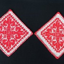 Pair of Kalotaszeg style cross stitch doilies
