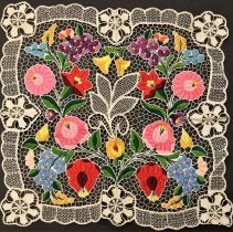 Kalocsa patterned embroidery on lace