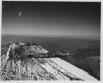 Plane flying by Mt. Fujiyama