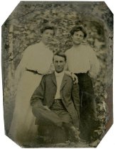 Unidentified man and two women