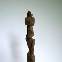 African Woman Walking with Basket on Head