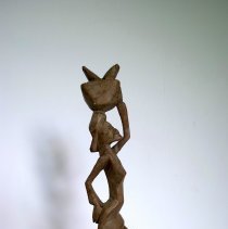 African Woman Walking with Basket on Head