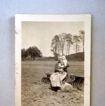 Anna Evans Reed holding child