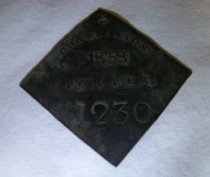 ID badge worn by enslaved person in Charleston, SC
"Porter/1230"