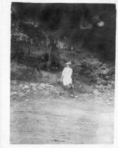 Unknown Woman Standing Far Away