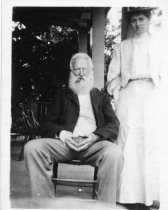 Agnes Peter Standing Next to Unidentified Older Man