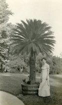 Agnes Peter Standing with Sago Palm