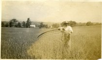 Unknown Man in Field with Grain Cradle