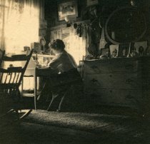 Unknown Woman Writing at a Desk