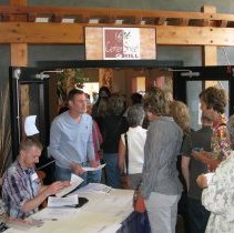People check in to the reception.