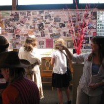 People look at trailblazer poster.