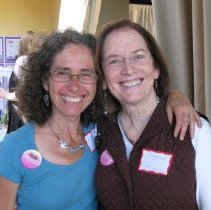 Mary O. poses with woman.