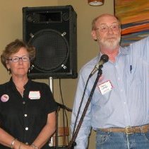 John Laird and Clare Sheils accept awards.
