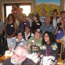 Candid of crowd at award ceremony.