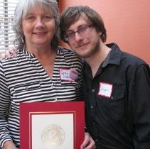 Cynthia Druley poses with award.