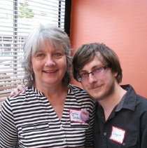 Cynthia poses with award.
