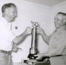 Eastside Dairy owners pose with trophy