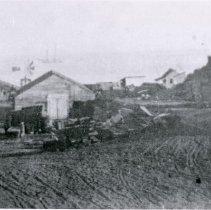Stereopticon view of barn and wharf.