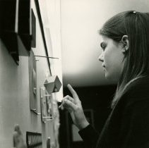 Unknown Student Touching Art