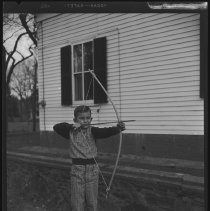 Boy with bow and arrow