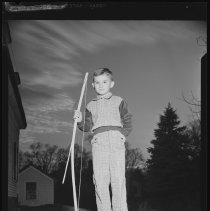 Boy with bow and arrow