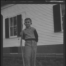 Boy with bow and arrow