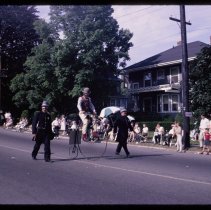 Haverhill 325th Anniversary Parade, police and bicyclist, 1965