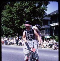 Haverhill 325th Anniversary Parade, men in costume on bicycle, 1965