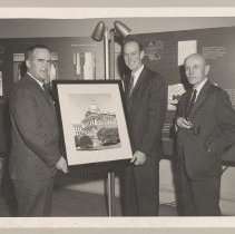 Charles M. Fleischner, librarian, and two men, photograph of State House
