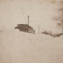 Georgetown Line streetcar behind snowbank