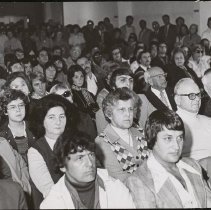 A large crowd at a meeting or lecture