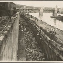 Cofferdam and wall along Merrimack River, looking at Haverhill Bridge, 1937