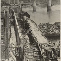 Completed first half of Merrimack River retaining wall and trench along Was