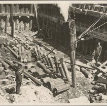 Driving wooden piling in cofferdam, 1937