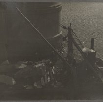 Construction barge carrying stones on the Merrimack River