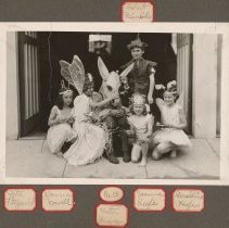Children in costumes at an art show