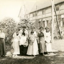 Roycrofters with tennis racquets